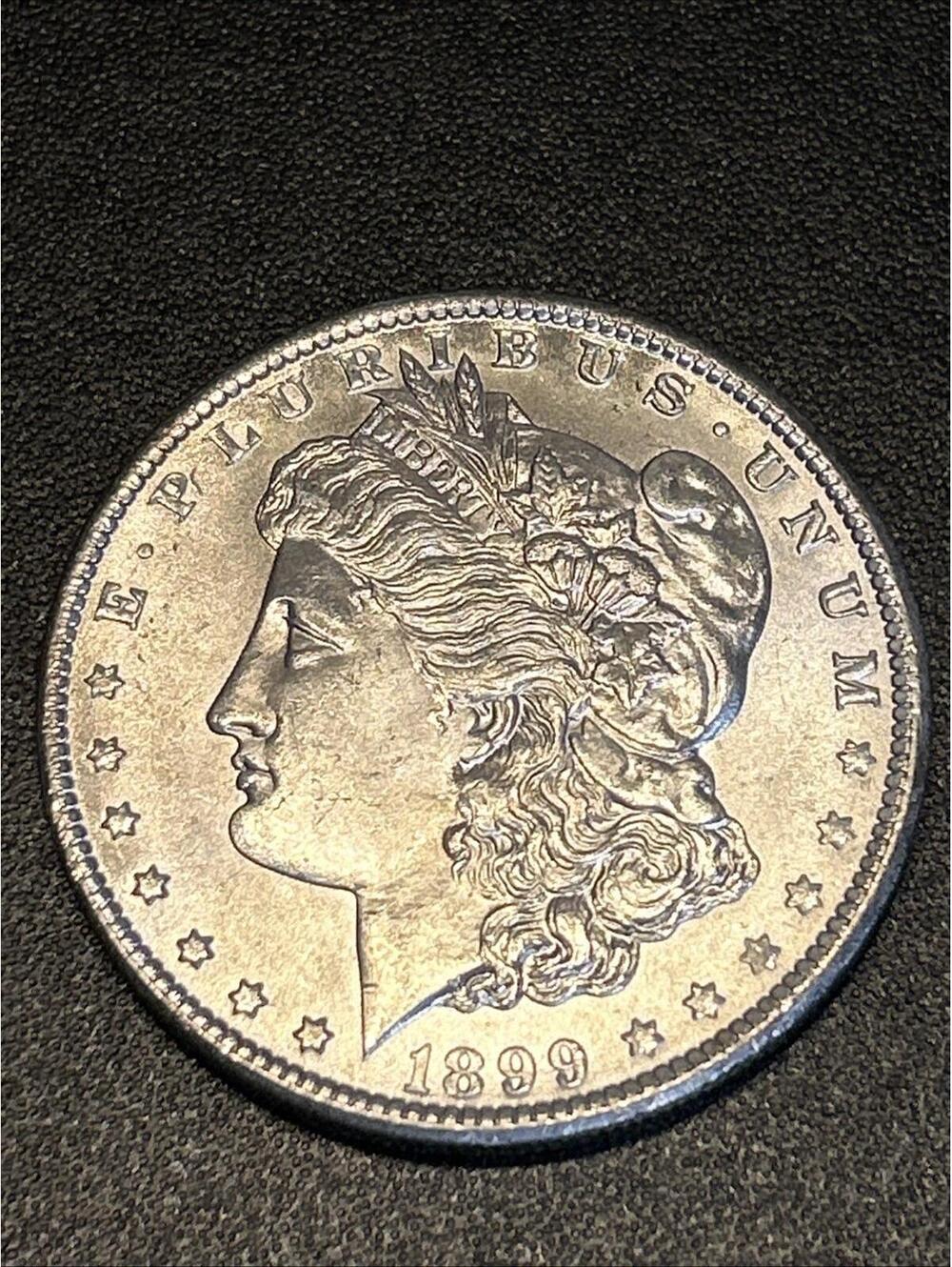 1899 O Morgan Silver Dollar Error Coin-Die Crack On Reverse.See Outer Edge